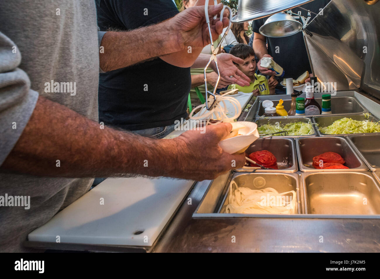 Food condiments for hot dogs and hamburgers at county fair Stock Photo