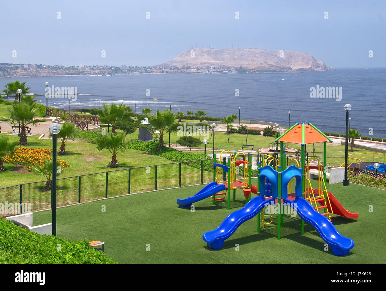 park outdoor coast peru slide playground tree park horizontal outdoor coast Stock Photo