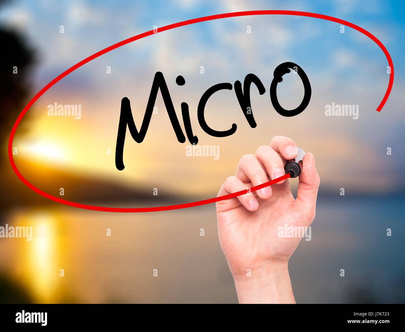 Micro Sign Handwrite Man Hand writing Micro with black marker on visual screen. Isolated on ...