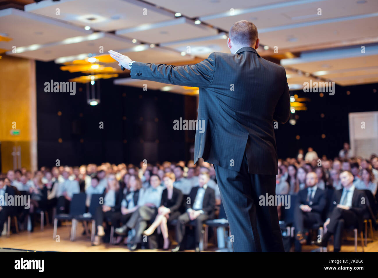 Speaker giving talk at business conference event Stock Photo