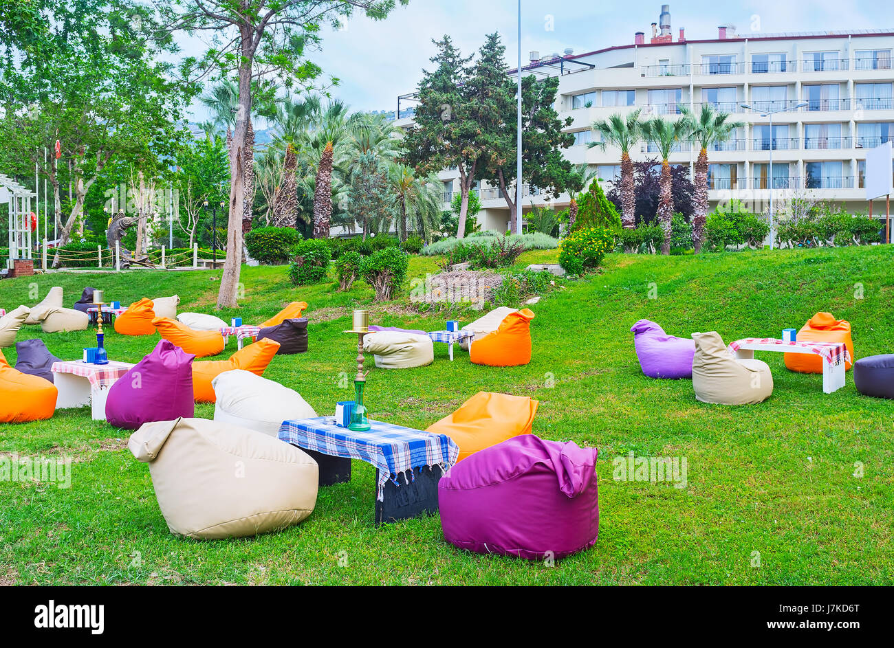 The Lovely Outdoor Lounge Cafe With Colorful Bean Bag Chairs And Shishas On Tables Kemer Turkey Stock Photo Alamy