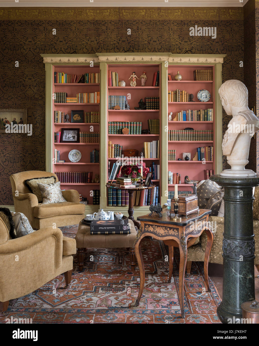 Patterned wallpaper by Zuber in library with antique persian rug and marble plinth and bust. The sofa and armchairs are from Beaumont & Flectcher Stock Photo - Alamy Patterned wallpaper by Zuber in library with antique persian rug and marble plinth and bust. The sofa and armchairs are from Beaumont & Flectcher Stock Photo - Alamy