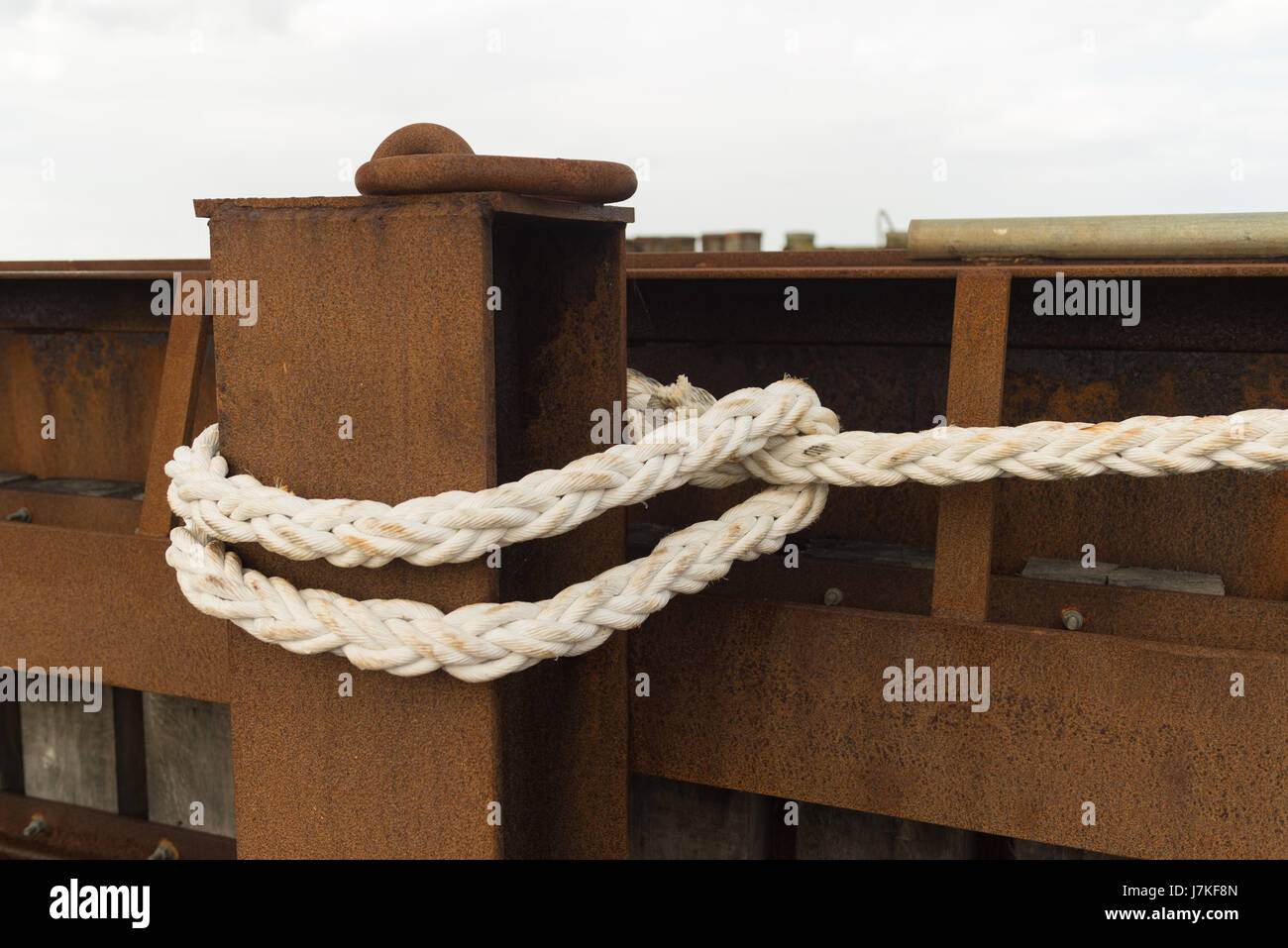 fixation of a ship with a peace of rope Stock Photo