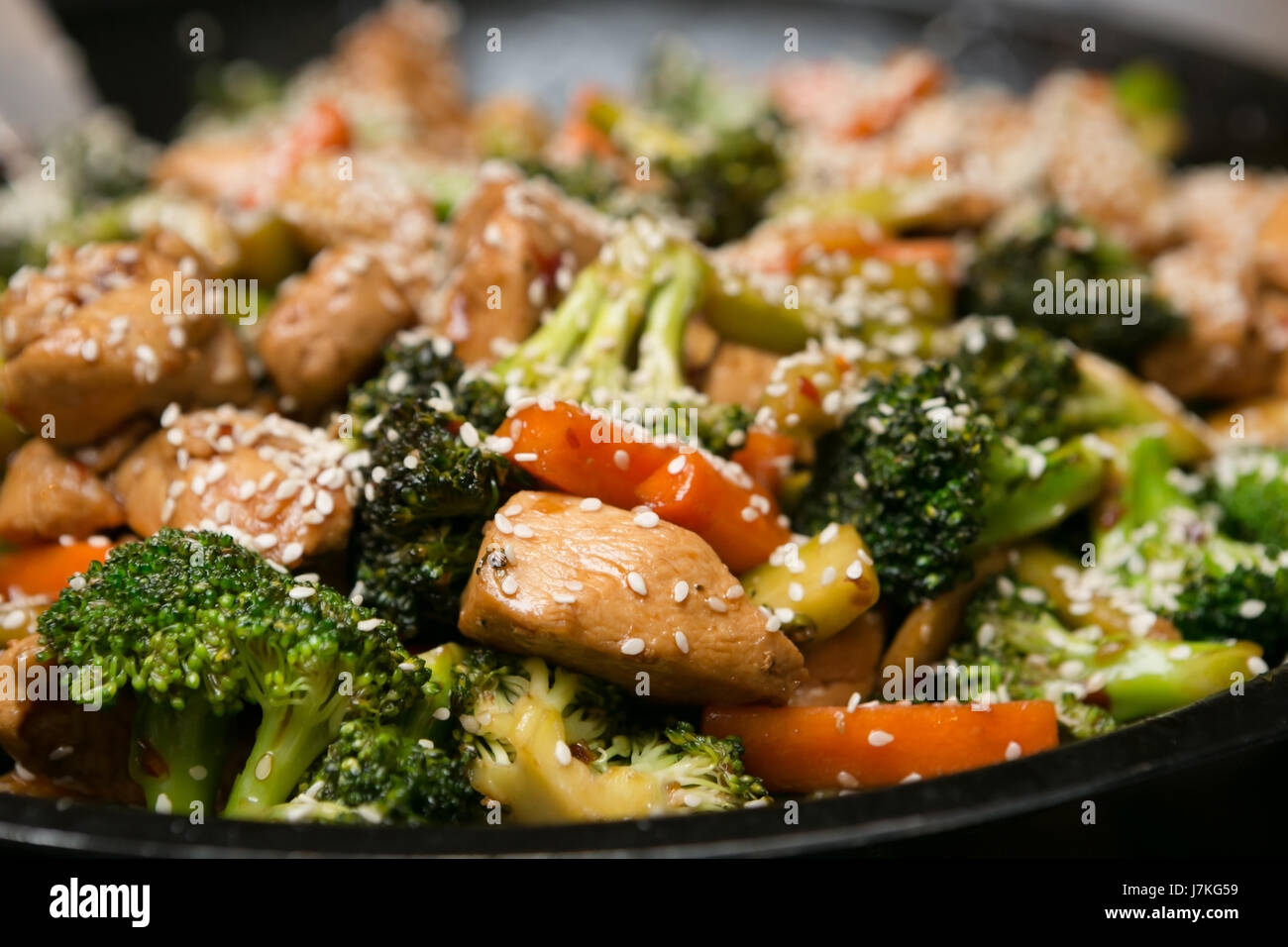 Delicious Asian Sesame Chicken and Vegetable Stir Fry Stock Photo - Alamy