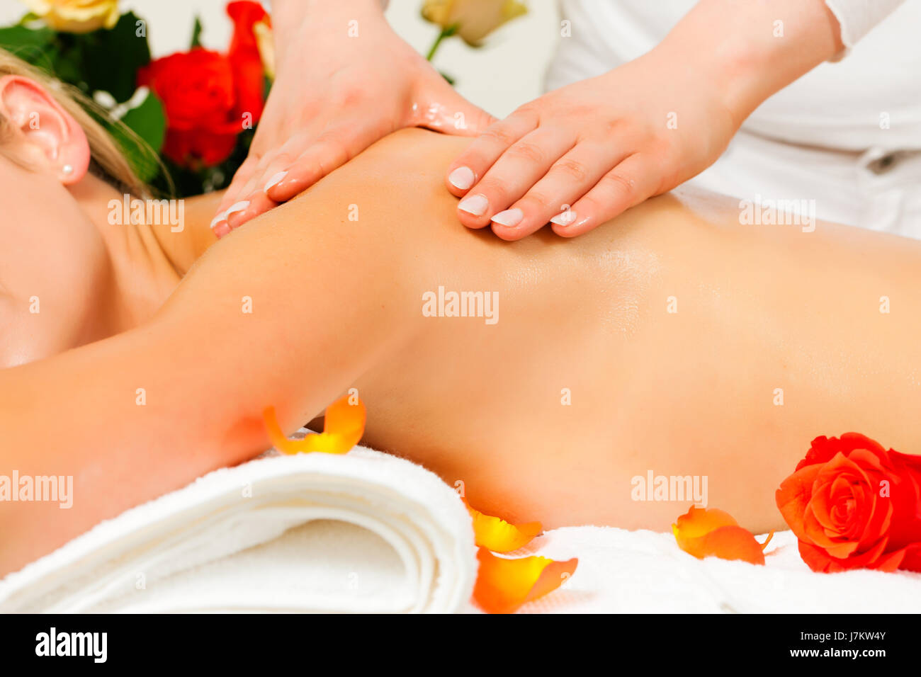 woman gets a massage spa Stock Photo