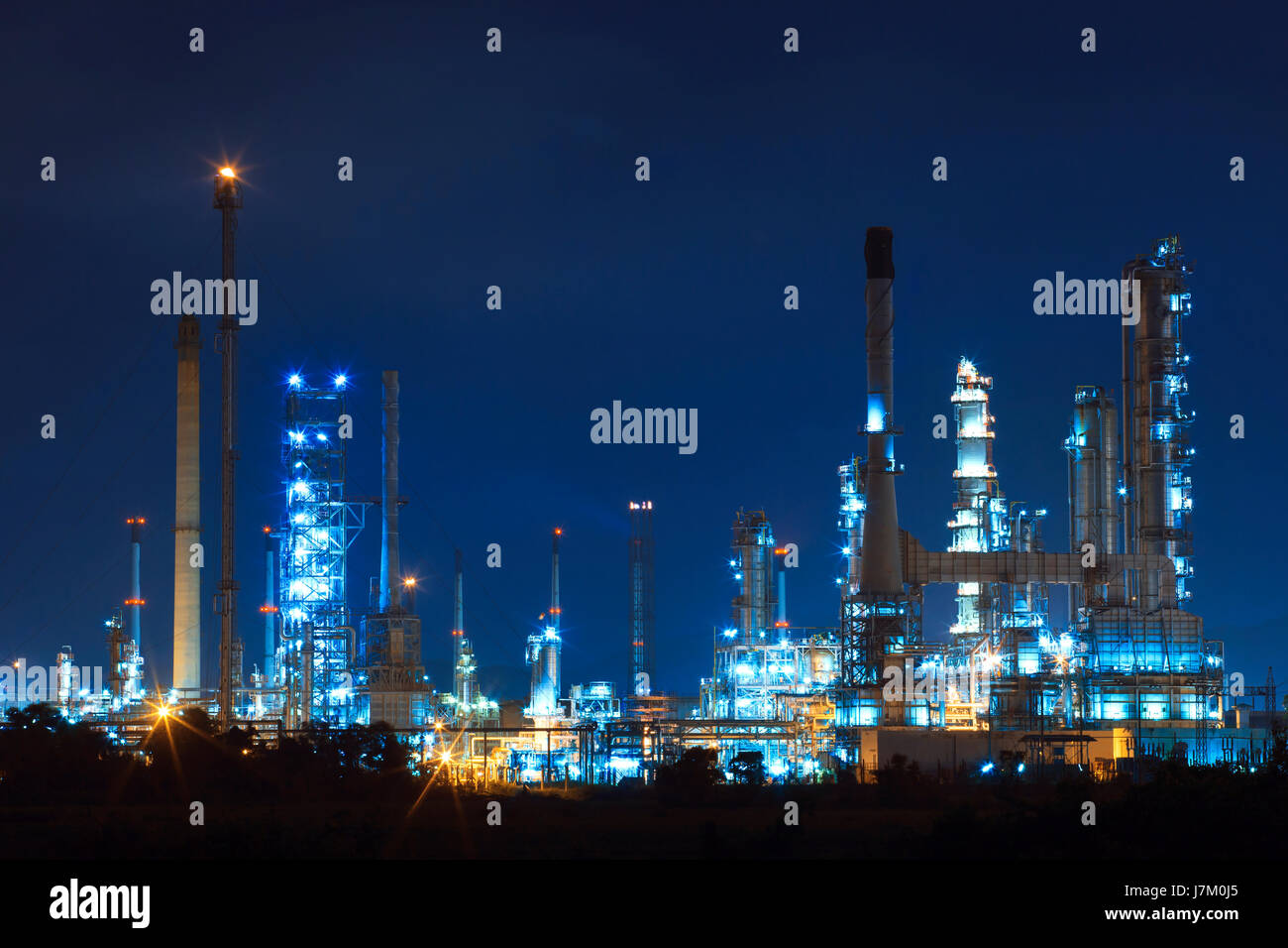 lighing landscape of oil refinery petrochemical in heavy industry estate use for power and energy topic Stock Photo