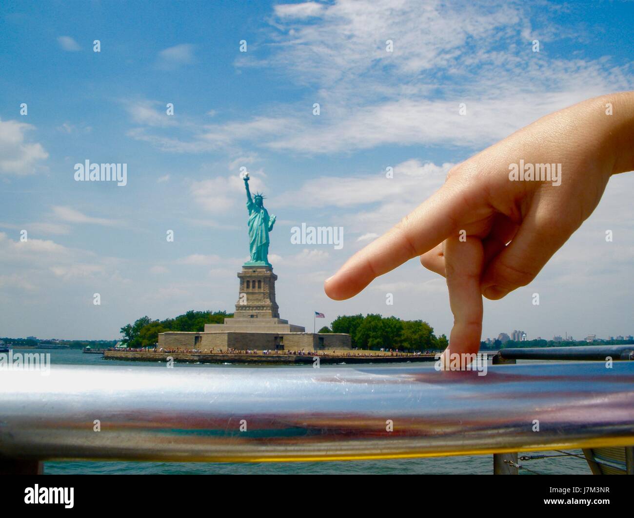 Dancing Fingers in front of the Statue of Liberty Stock Photo Alamy