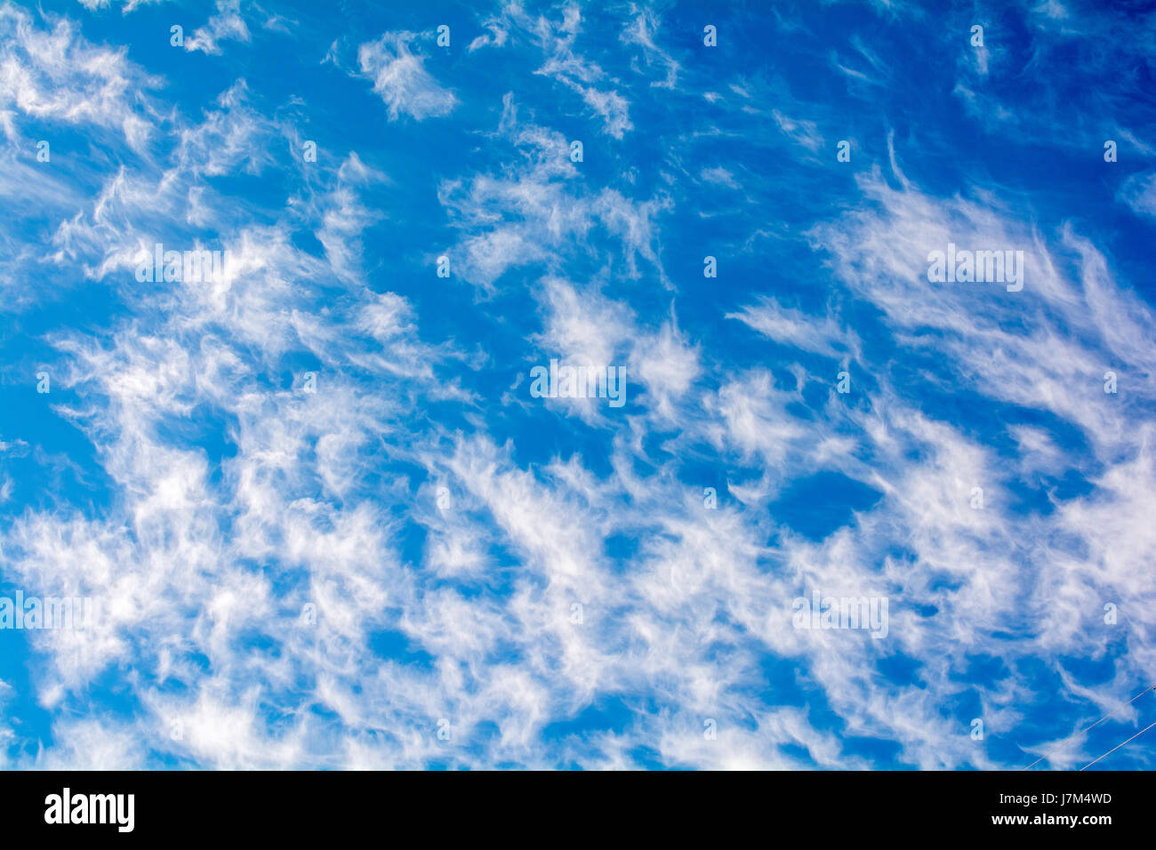 Cute Cirrus clouds in the blue sky picture perfect Stock Photo