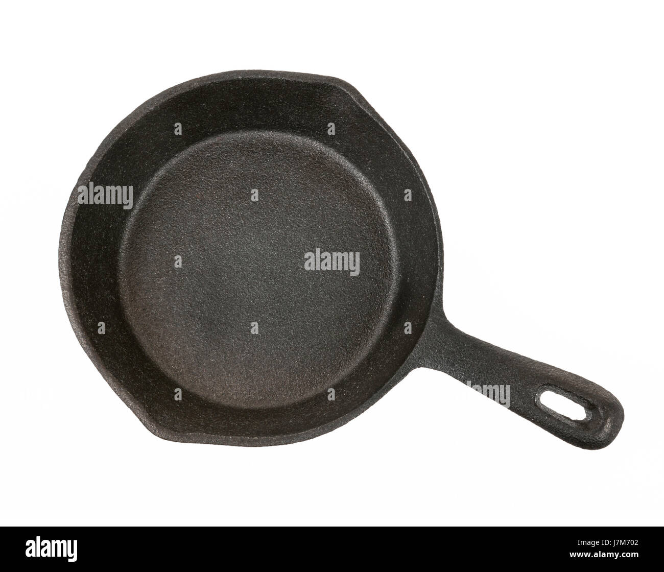 Cast iron black frying pan isolated on white background, from above Stock Photo
