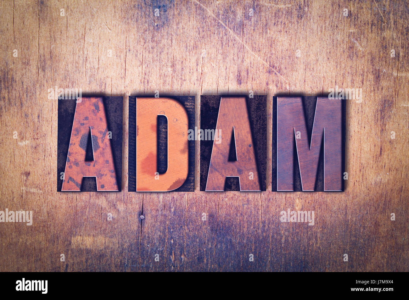 The name ADAM concept and theme written in vintage wooden letterpress