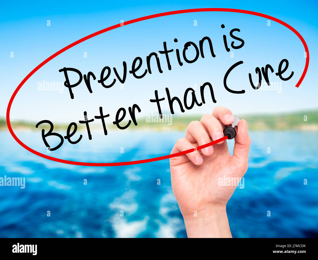 Man Hand Writing Prevention Is Better Than Cure With Black