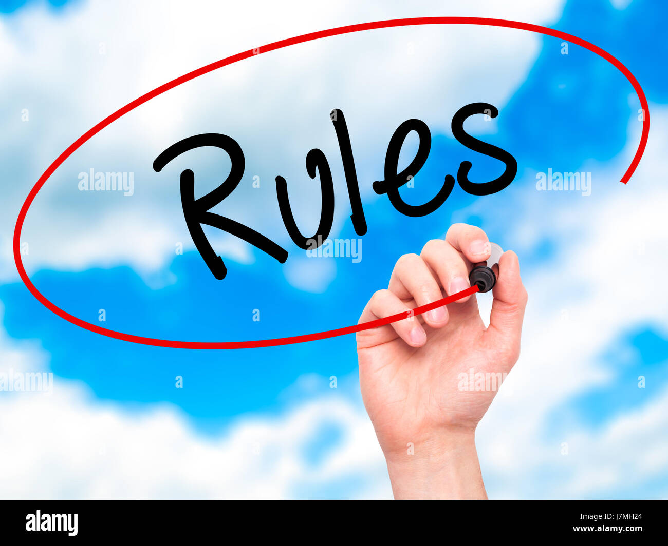 Man Hand writing Rules with black marker on visual screen. Isolated on ...