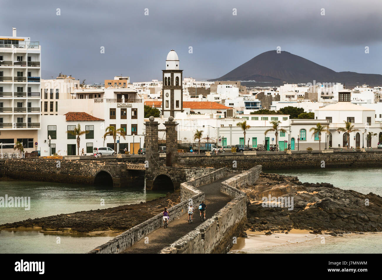 LANZAROTE - JANUARY 5: View from the Castillo de St. Gabriel to Arrecife in Lanzarote, Spain with dark clouds on January 5, 2016. Stock Photo