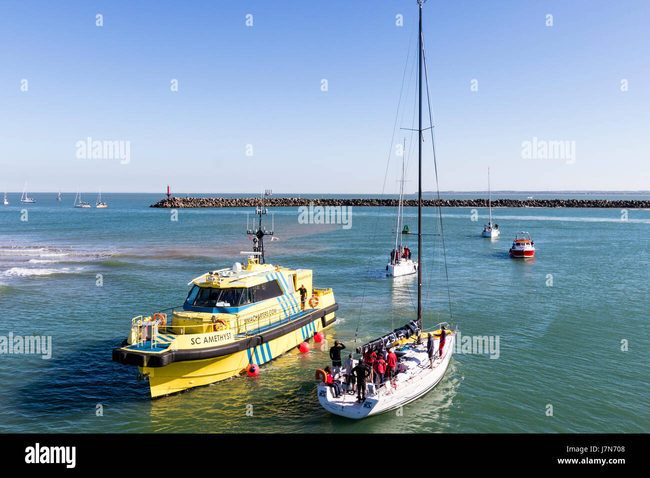 Yachts sailing into harbour after competing in the EuroRegatta race