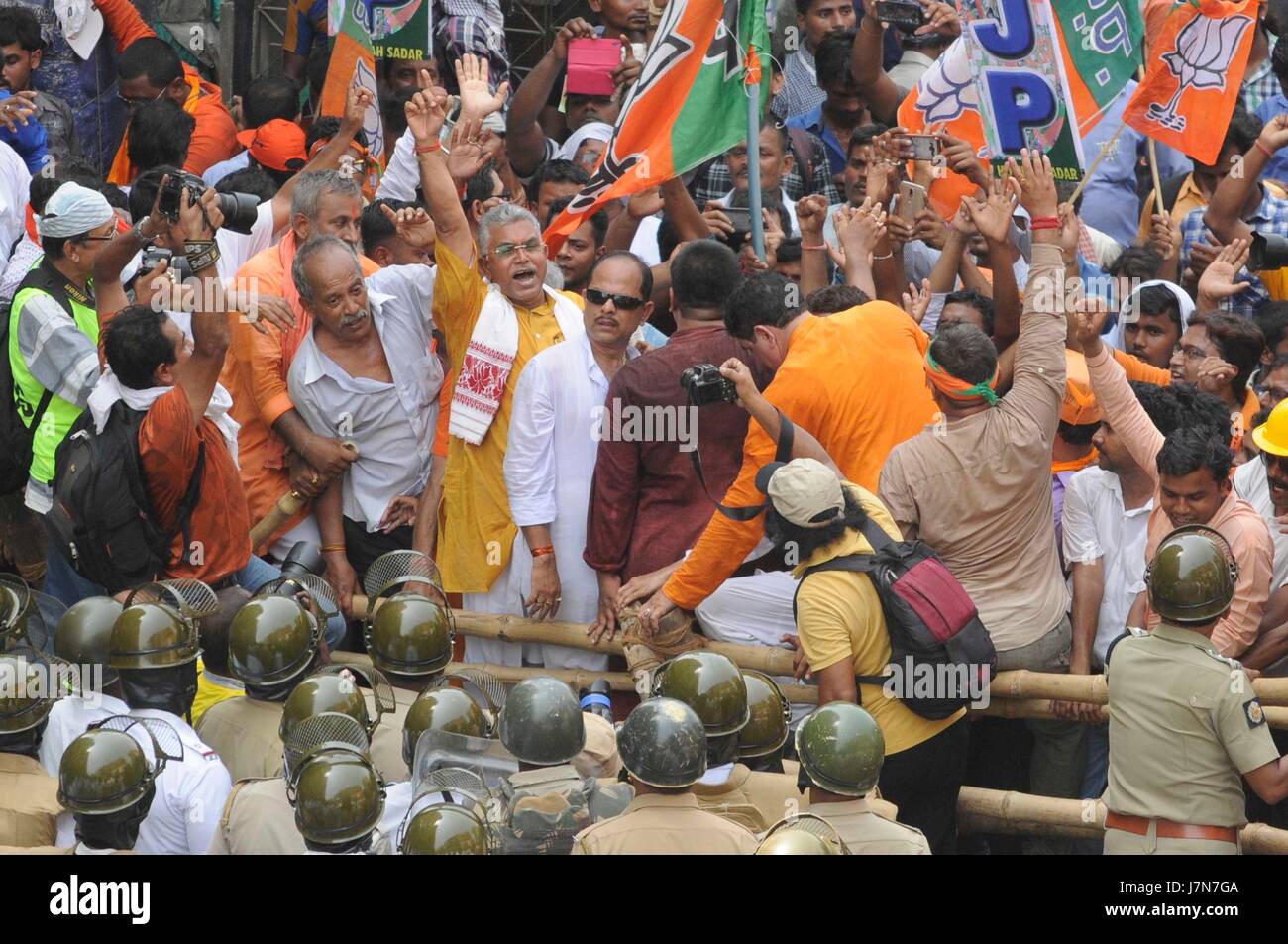 KOLKATA, INDIA - MAY 25 BJP leaders climbing on barricades during a ...