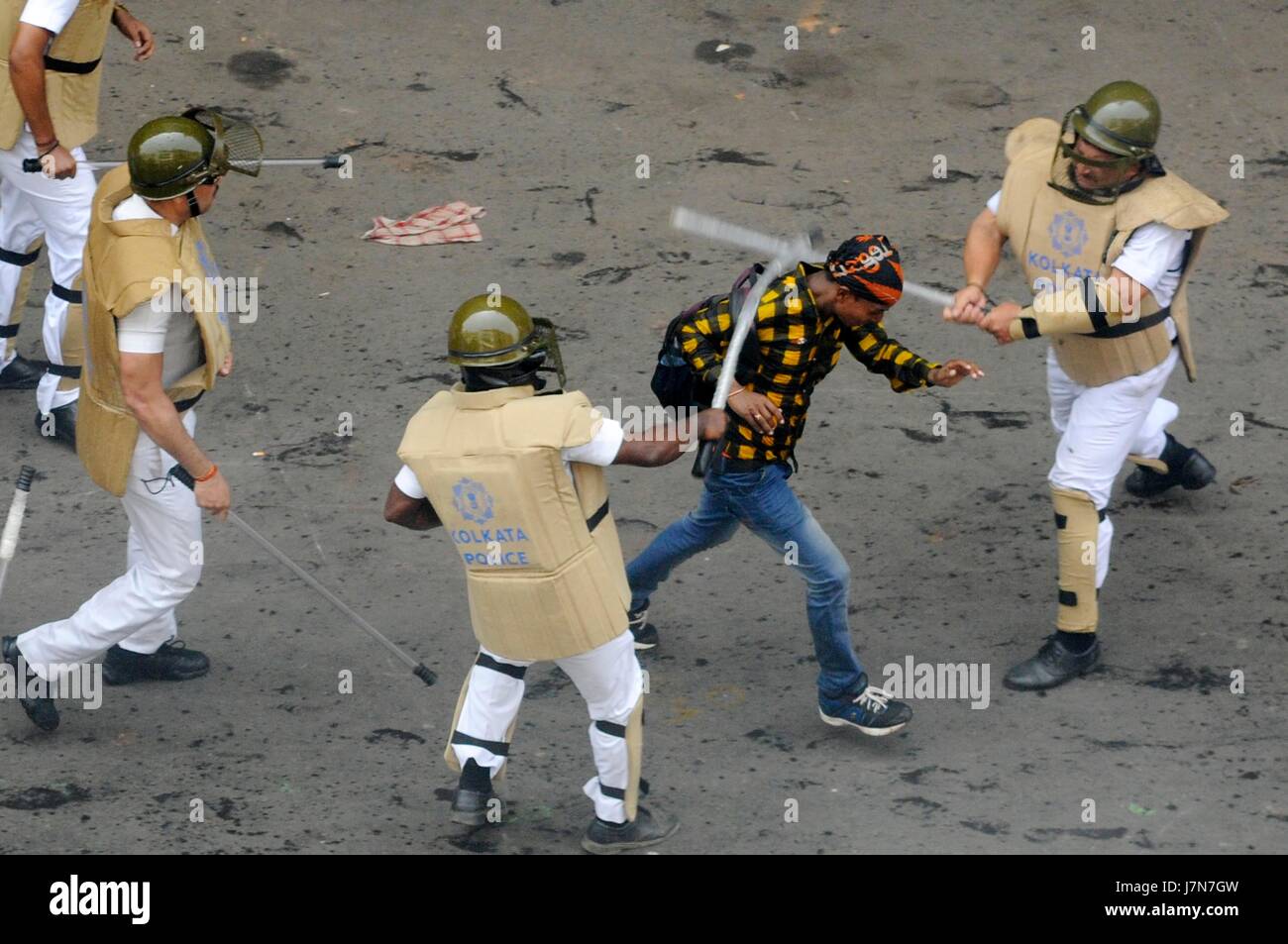 KOLKATA, INDIA - MAY 25: Police lathi charge on the BJP workers during ...