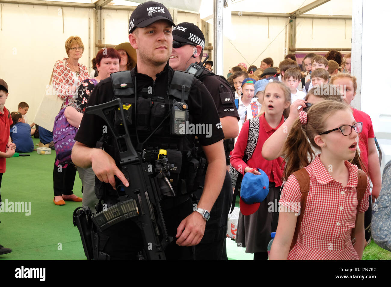Hay Festival 2017 - Hay on Wye, Wales, UK - May 2017 - Armed police officers patrol the  opening day of this years Hay Festival which celebrates its 30th anniversary in 2017. Over 3,000 primary school children will attend Day 1 of the literary festival that runs until June 4th.  Steven May / Alamy Live News Stock Photo