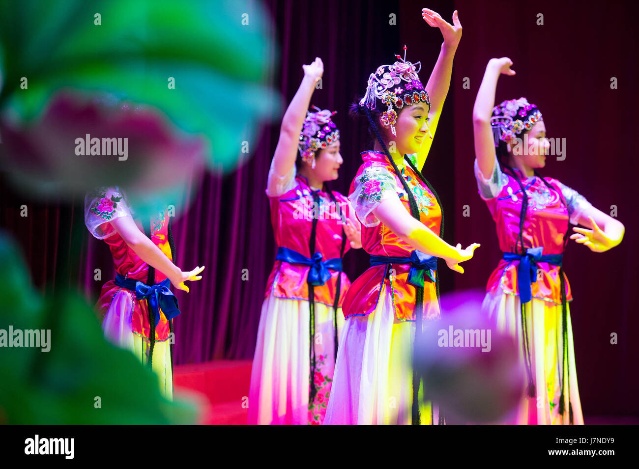 Macao, China. 26th May, 2017. Soldiers of the Chinese People's Liberation Army (PLA) Macao Garrison perform dancing for teachers and students during an activity to greet the upcoming International Children's Day at the primary school of Keang Peng School in Macao, south China, May 26, 2017. Credit: Cheong Kam Ka/Xinhua/Alamy Live News Stock Photo