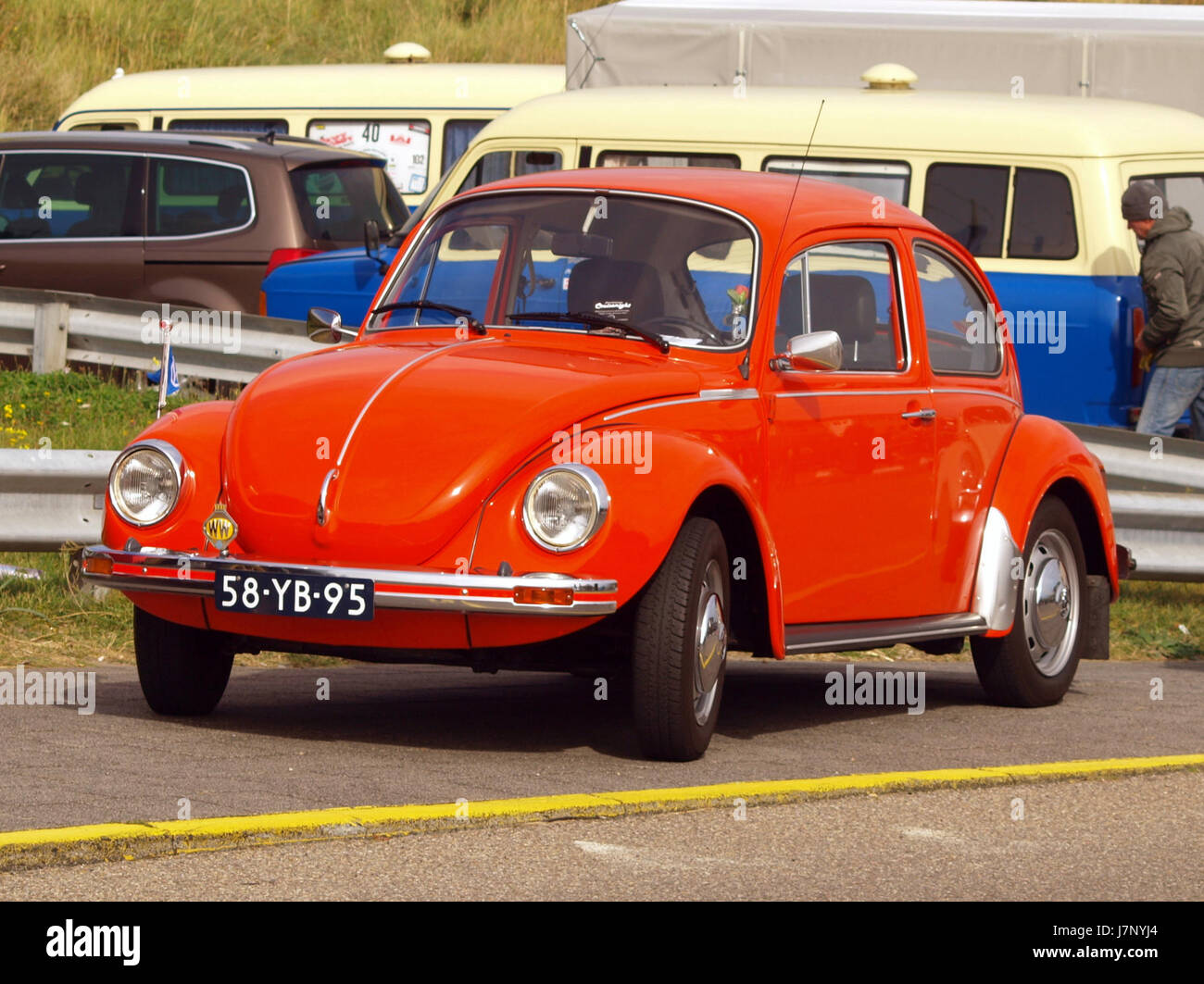 A classic 1975 Volkswagen Beetle, a compact car produced by Volkswagen, known for its distinctive design and popularity during the 1970s. Stock Photo