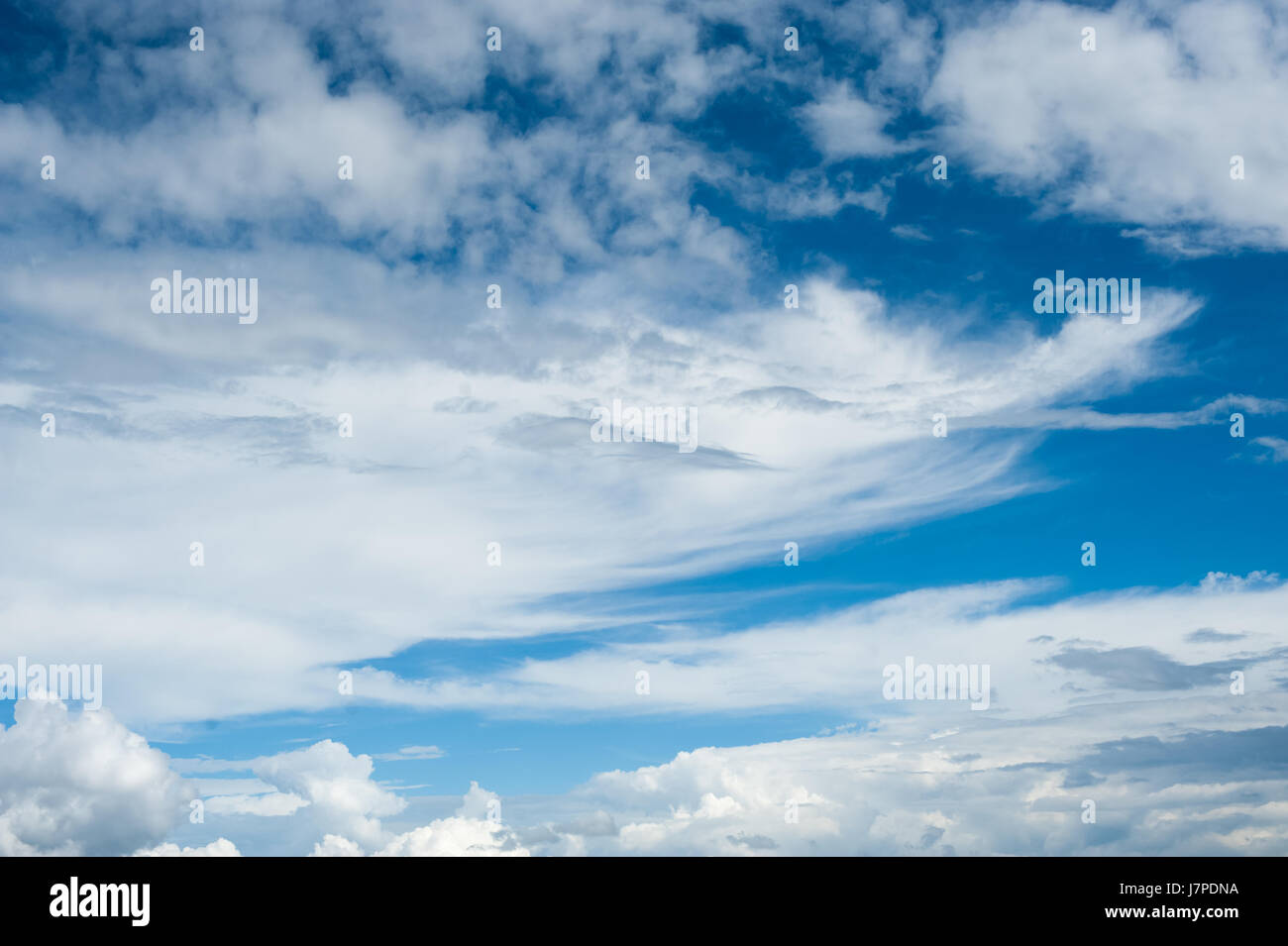 white fluffy clouds with background blue sky Stock Photo - Alamy