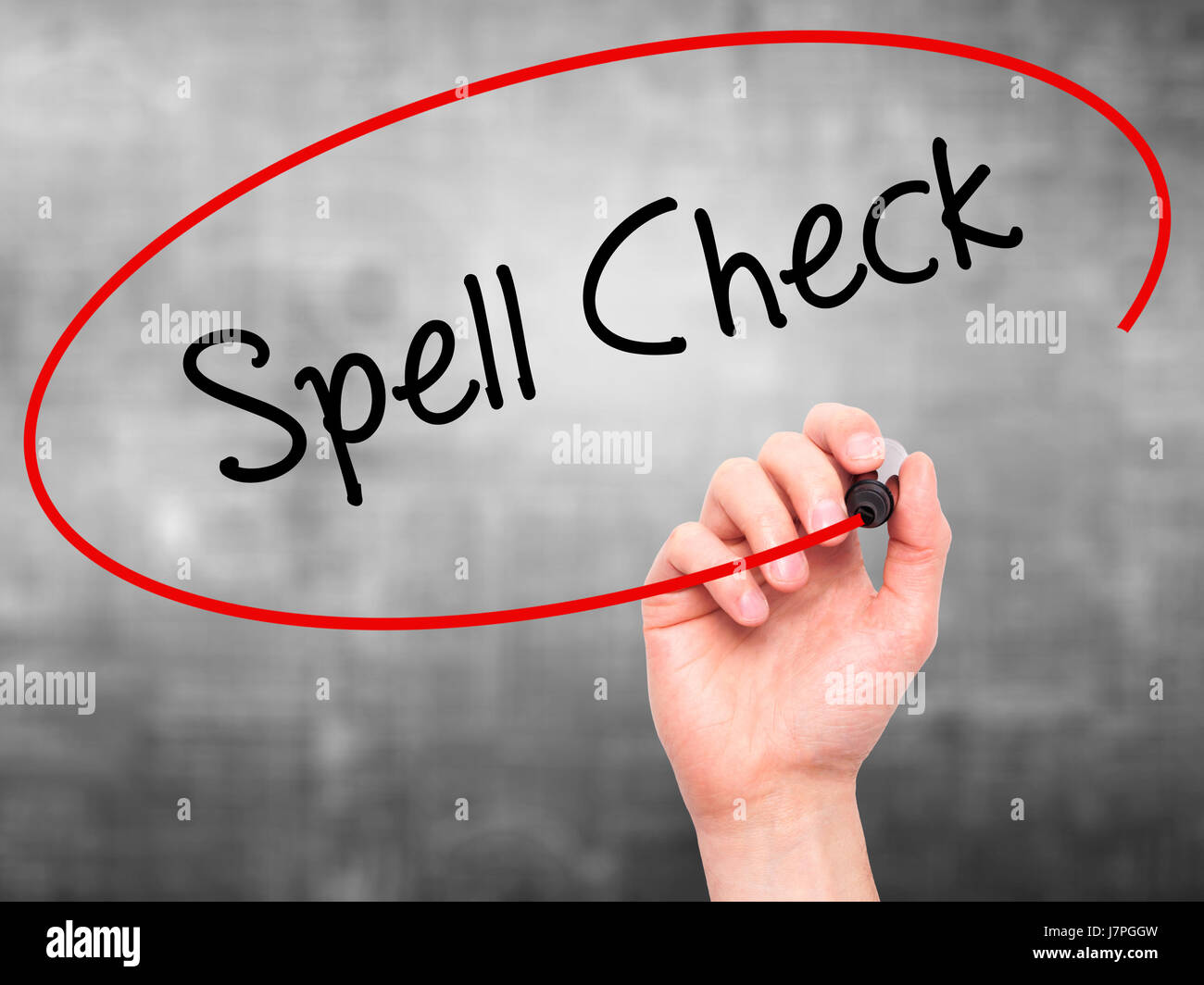 Hand Spel Check In Man Hand writing Spell Check with black marker on visual screen ...