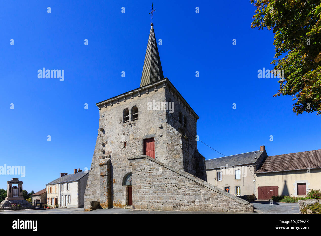 France, Creuse, Toulx Sainte Croix, the church with bell tower separated from the nave Stock Photo