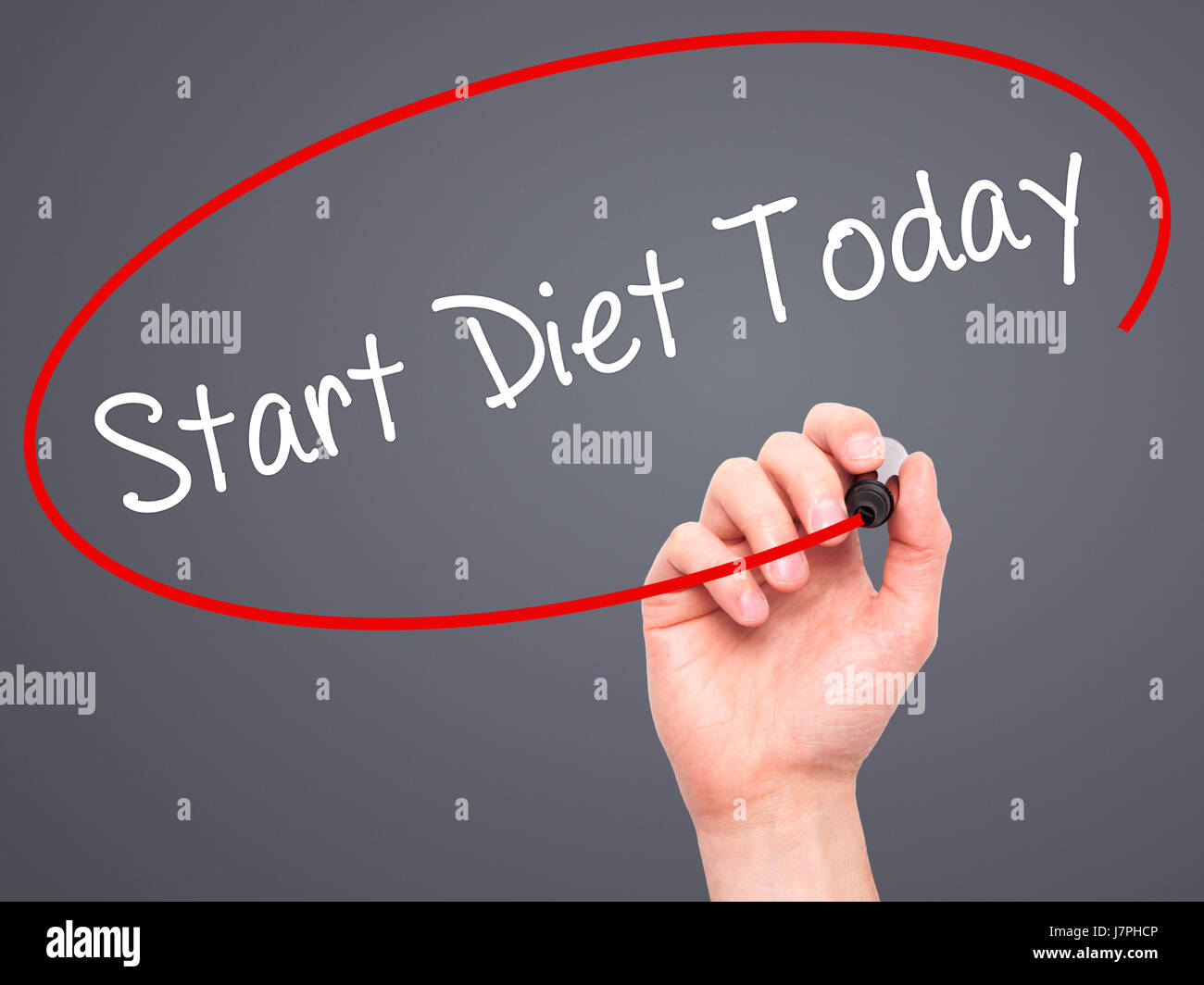Man Hand writing Start Diet Today  with black marker on visual screen. Isolated on grey. Business, technology, internet concept. Stock Photo Stock Photo