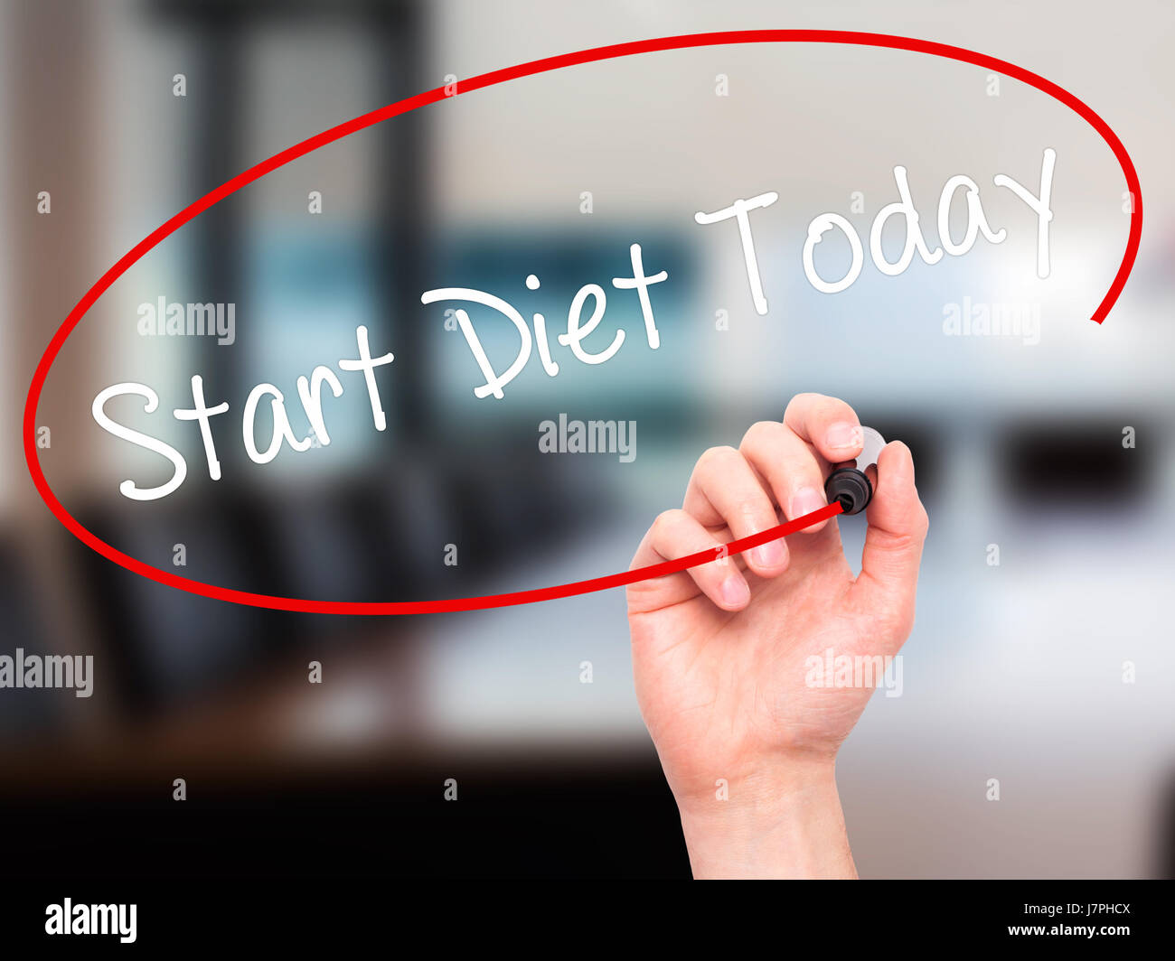 Man Hand writing Start Diet Today  with black marker on visual screen. Isolated on office. Business, technology, internet concept. Stock Photo Stock Photo