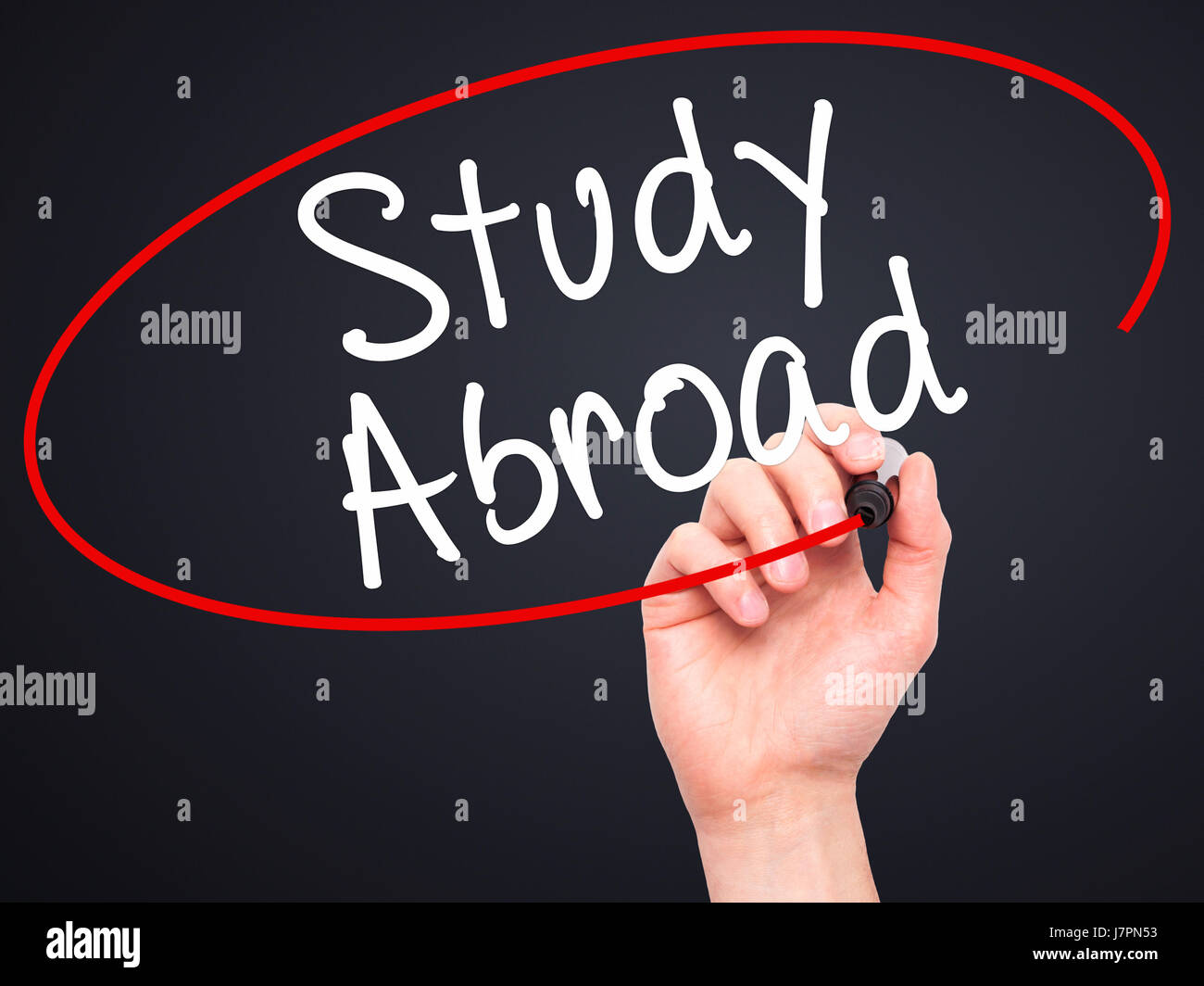 Man Hand writing Study Abroad with black marker on visual screen ...