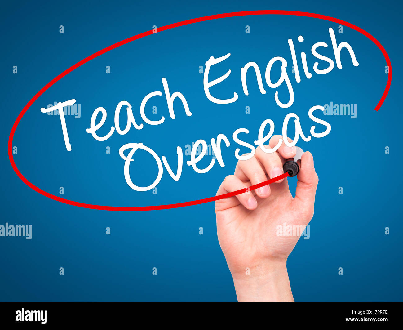 Man Hand writing Teach English Overseas with black marker on visual ...