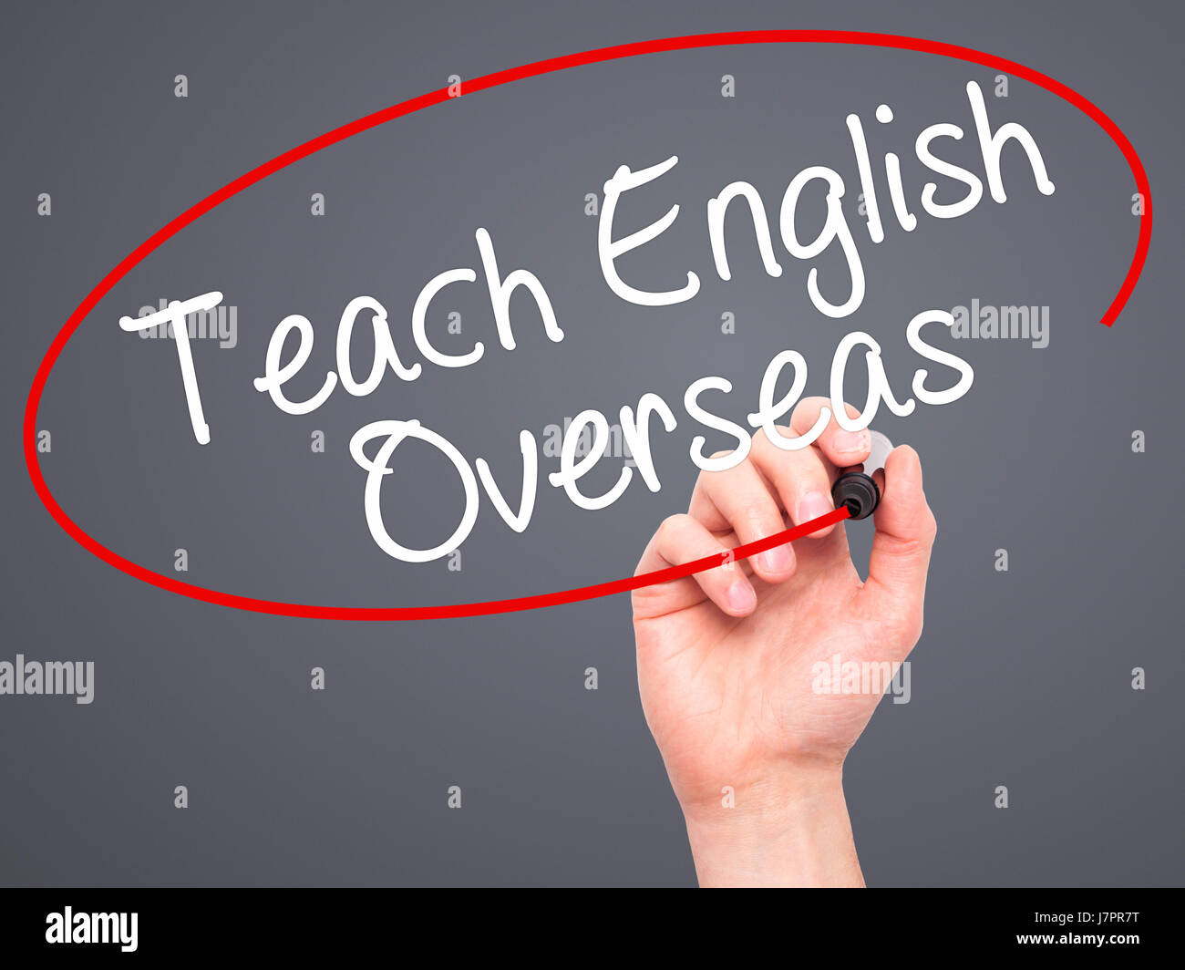 Man Hand writing Teach English Overseas with black marker on visual ...