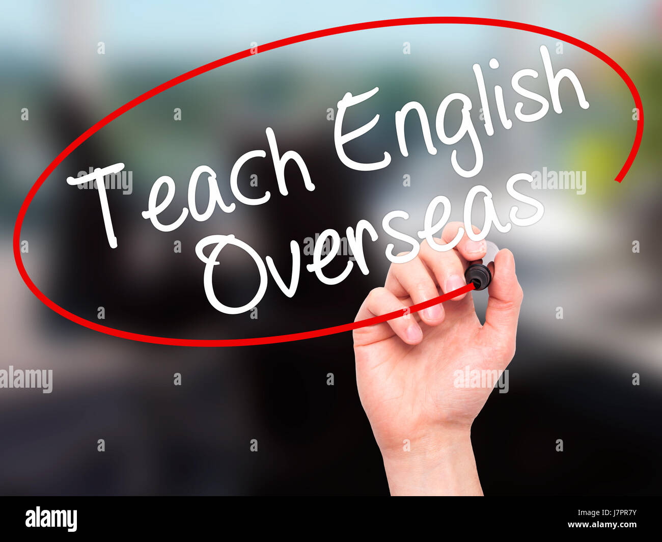 Man Hand writing Teach English Overseas with black marker on visual ...
