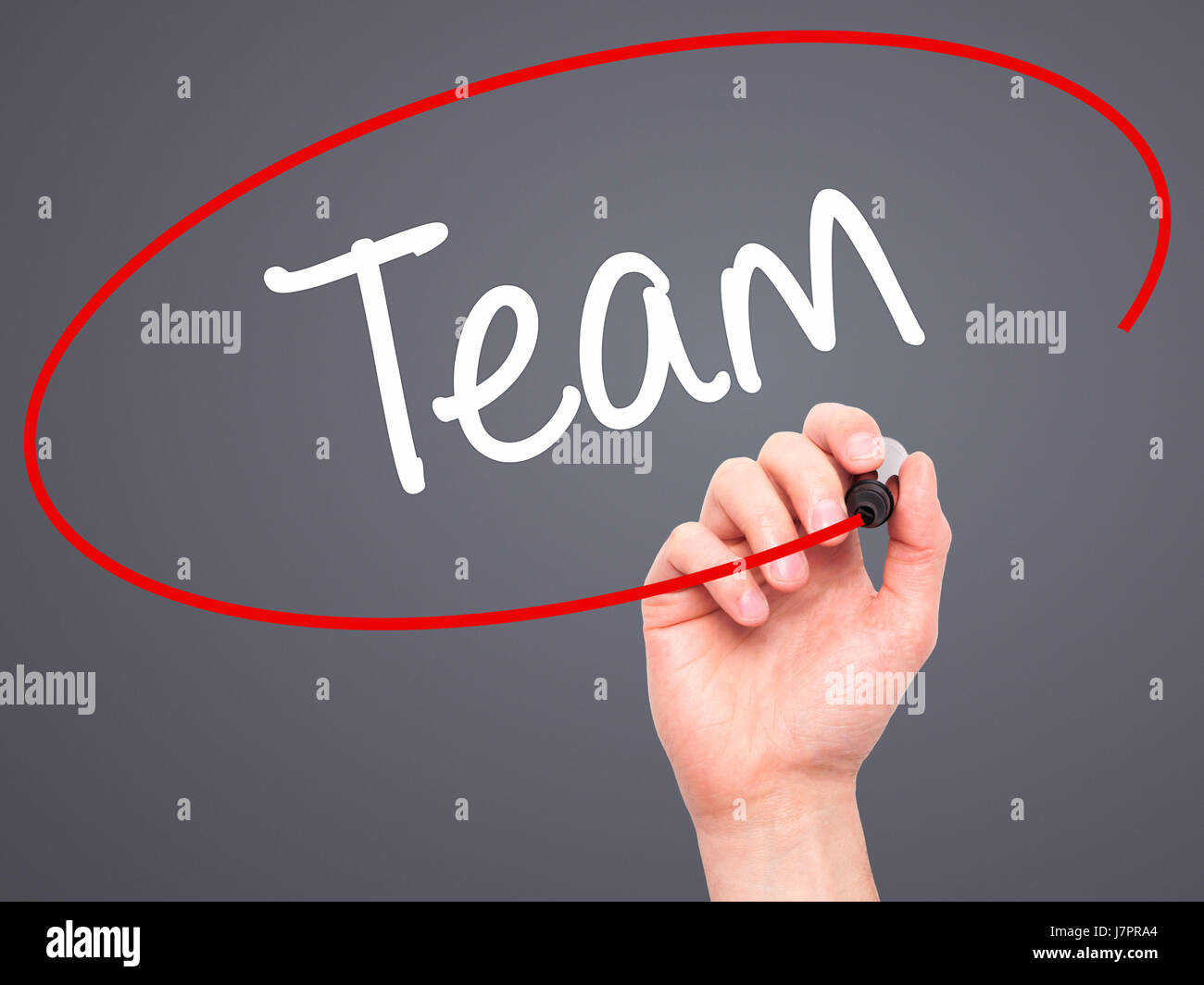 Man Hand writing Team with black marker on visual screen. Isolated on ...