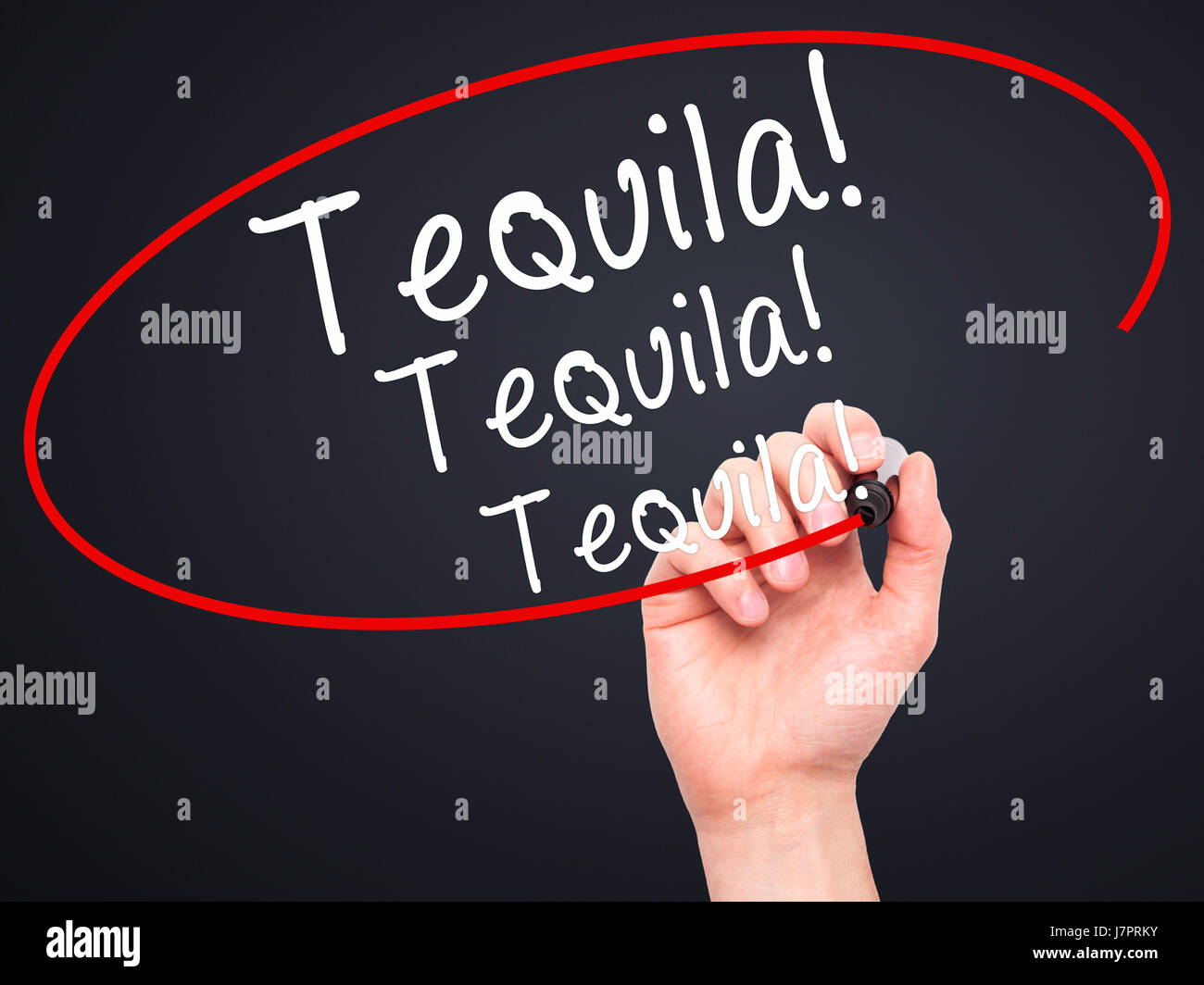 Man Hand writing Tequila with black marker on visual screen. Isolated on black. Business, technology, internet concept. Stock Photo Stock Photo