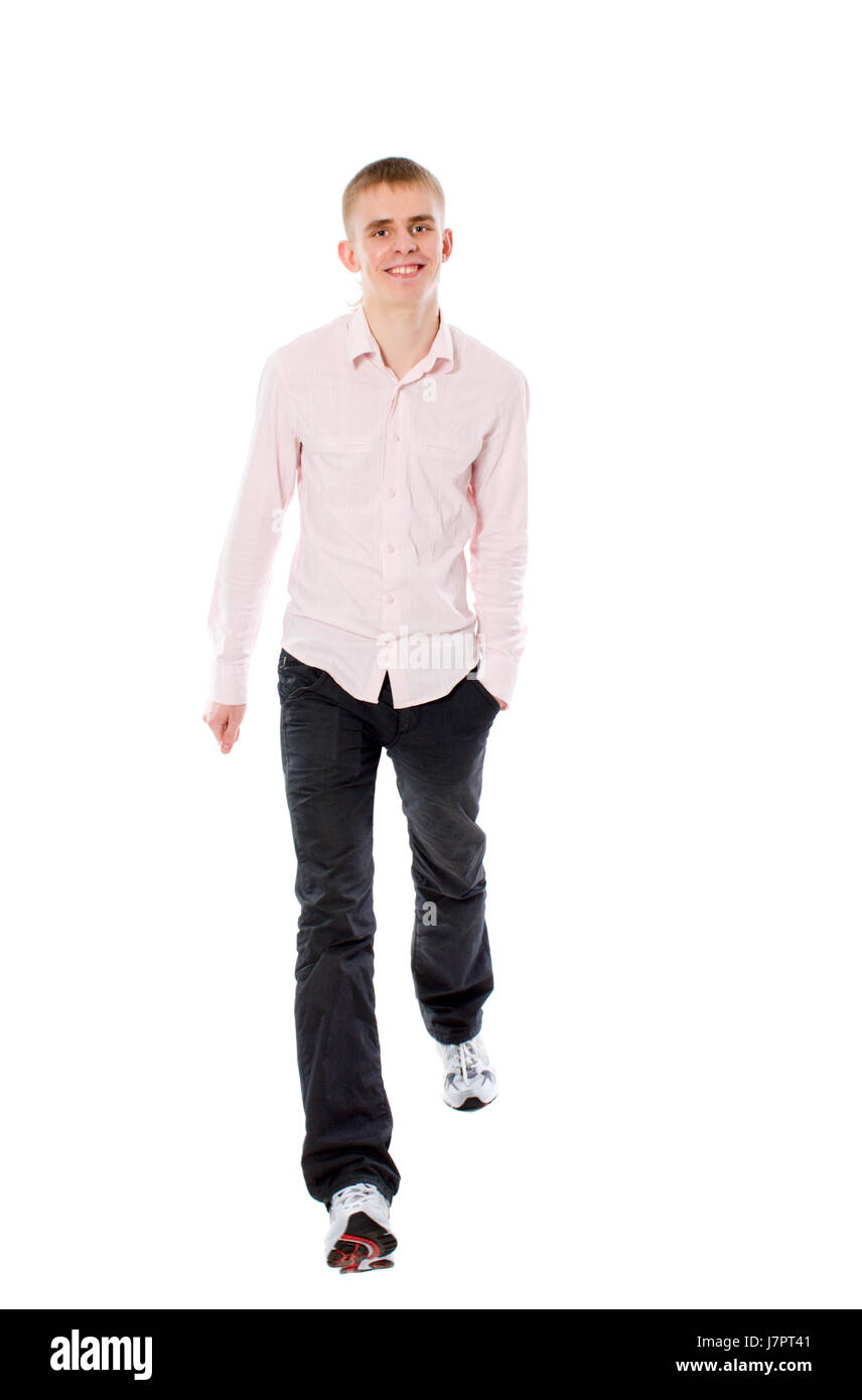 Young man walking smiling isolated on white Stock Photo - Alamy