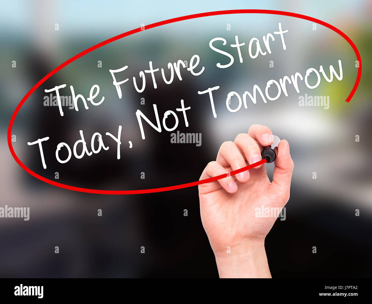 Man Hand writing The Future Start Today, Not Tomorrow with black marker ...