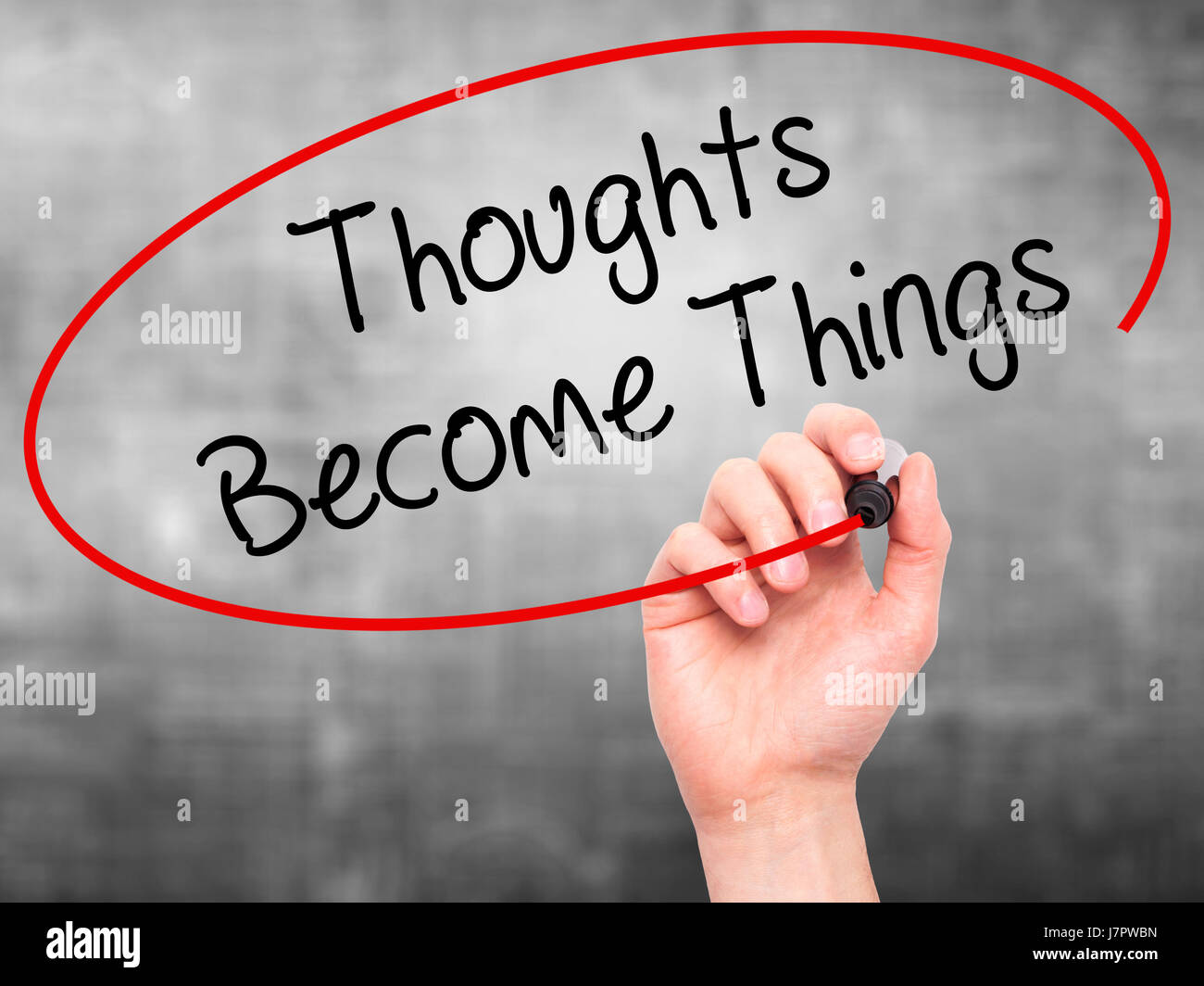Creating Thoughts Man Hand writing Thoughts Become Things with black marker on visual ...