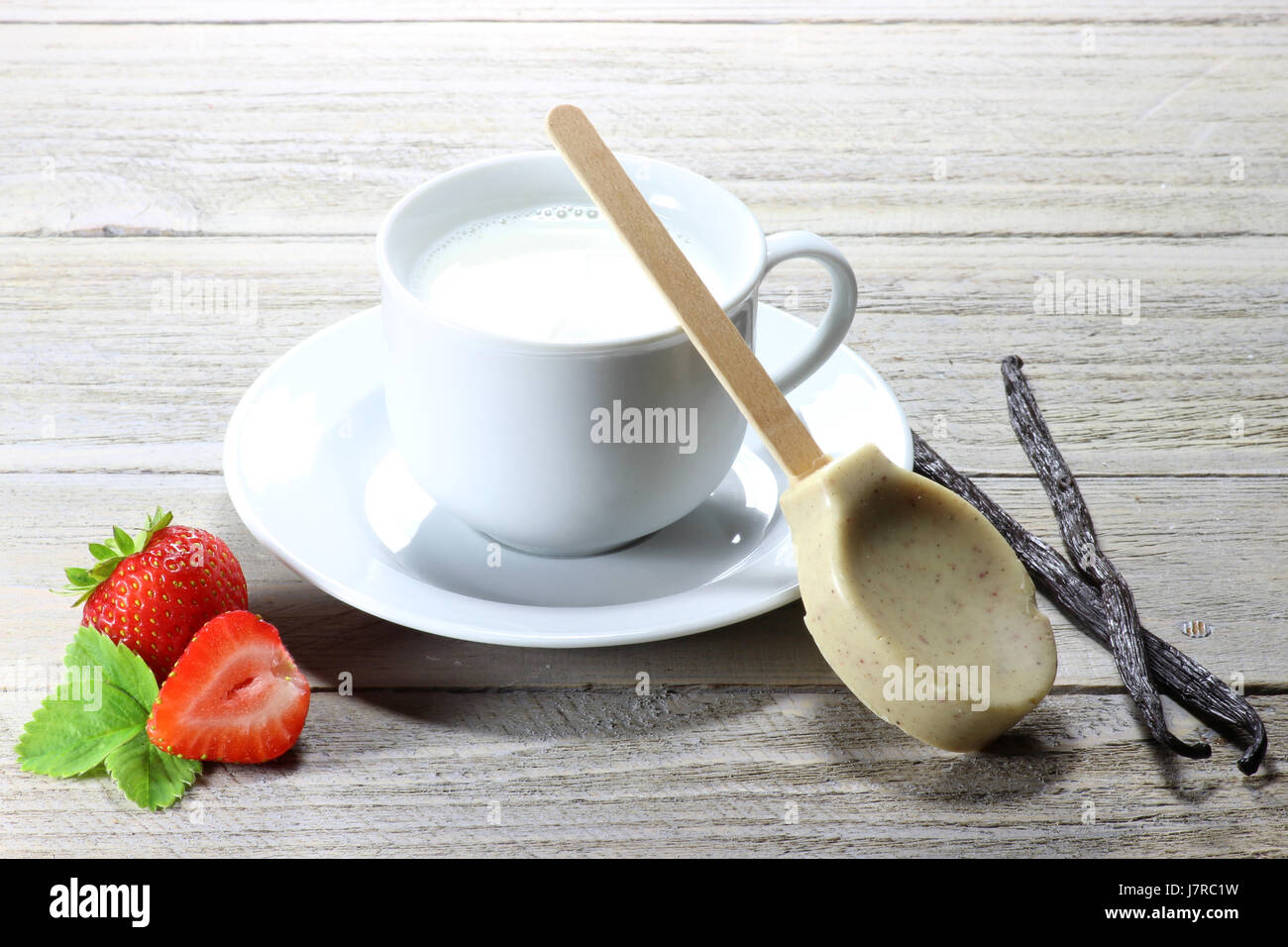 milk being prepared for a hot chocolate with strawberry flavor Stock Photo
