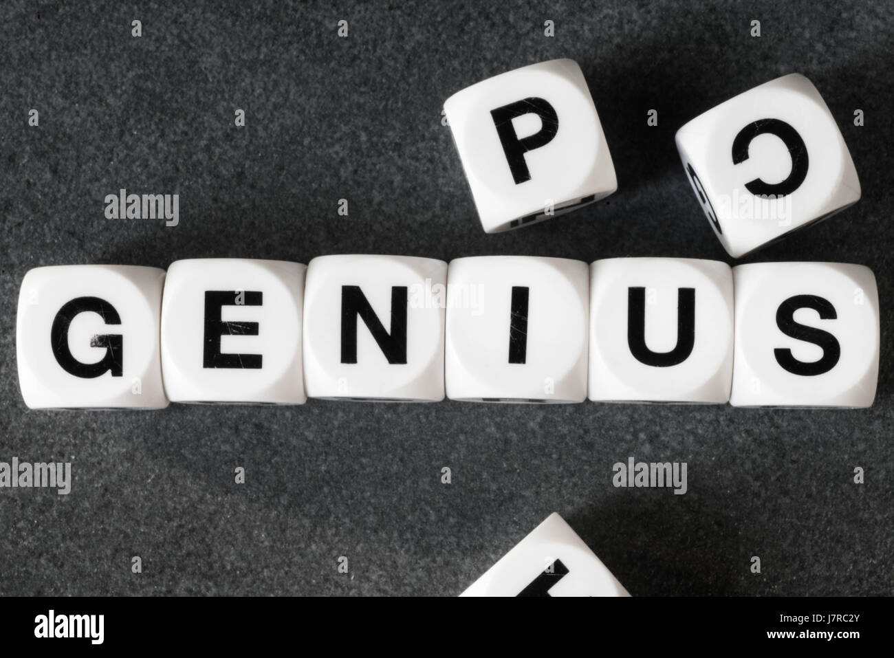 word genius on white toy cubes Stock Photo - Alamy