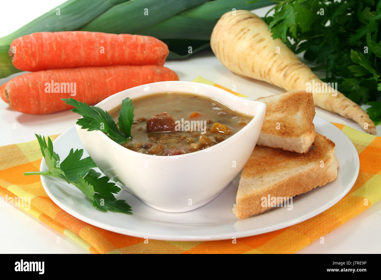 lens parsley mulligan soup brown brownish brunette vegetable lens food dish Stock Photo