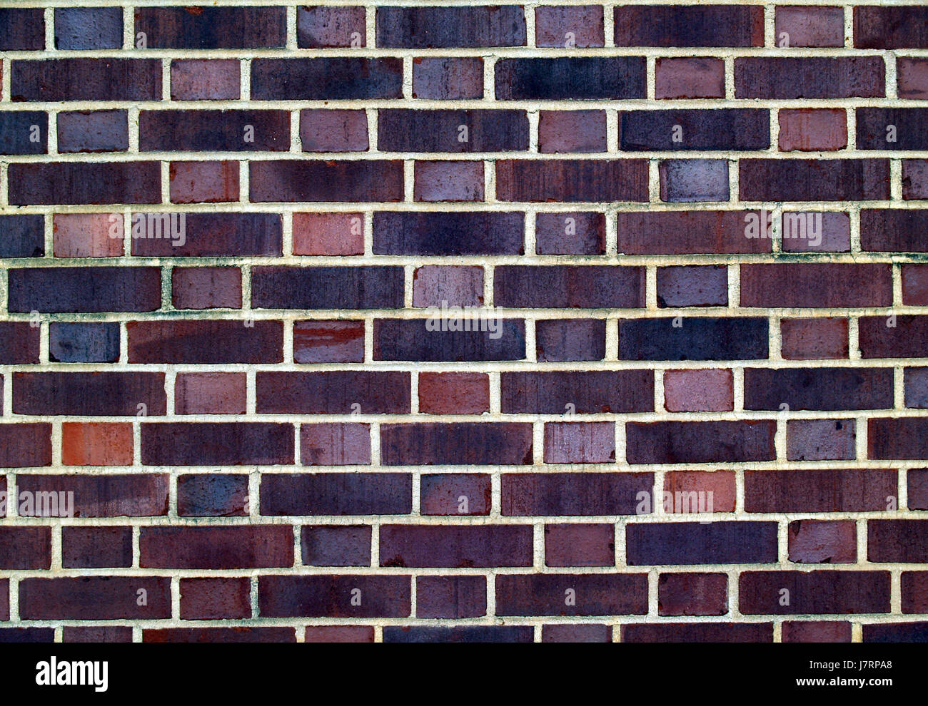 brown brownish brunette black swarthy jetblack deep black wall brick backdrop Stock Photo
