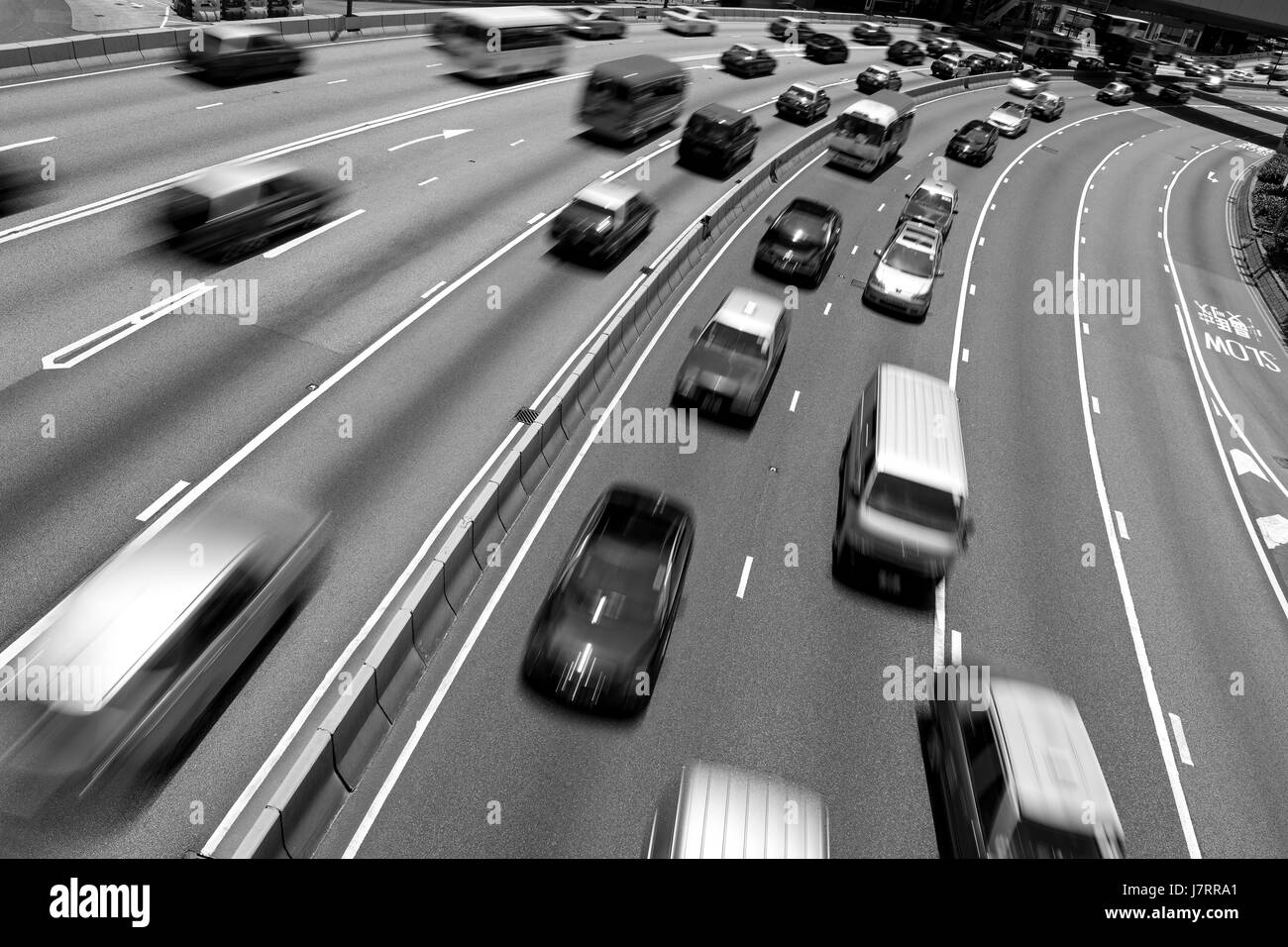 Traffic on multiple lane highway with motion blur (Black and White) Stock Photo