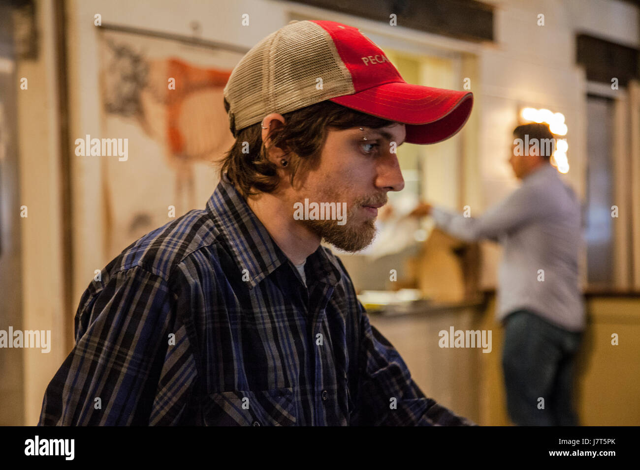 Cashier at Pecan Lodge, Deep Ellum, Dallas, Texas Stock Photo