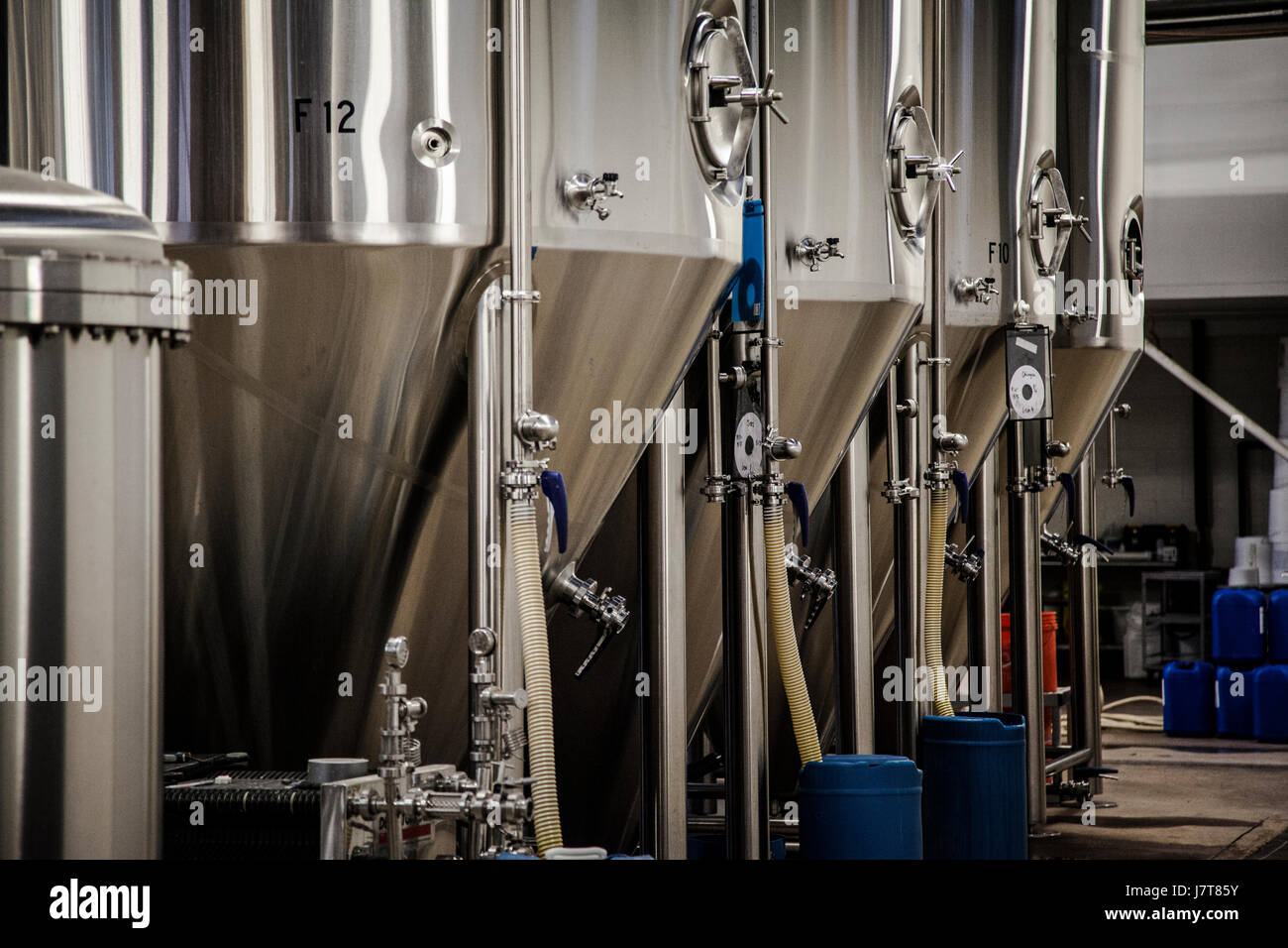 Barrels in brewery Stock Photo Alamy