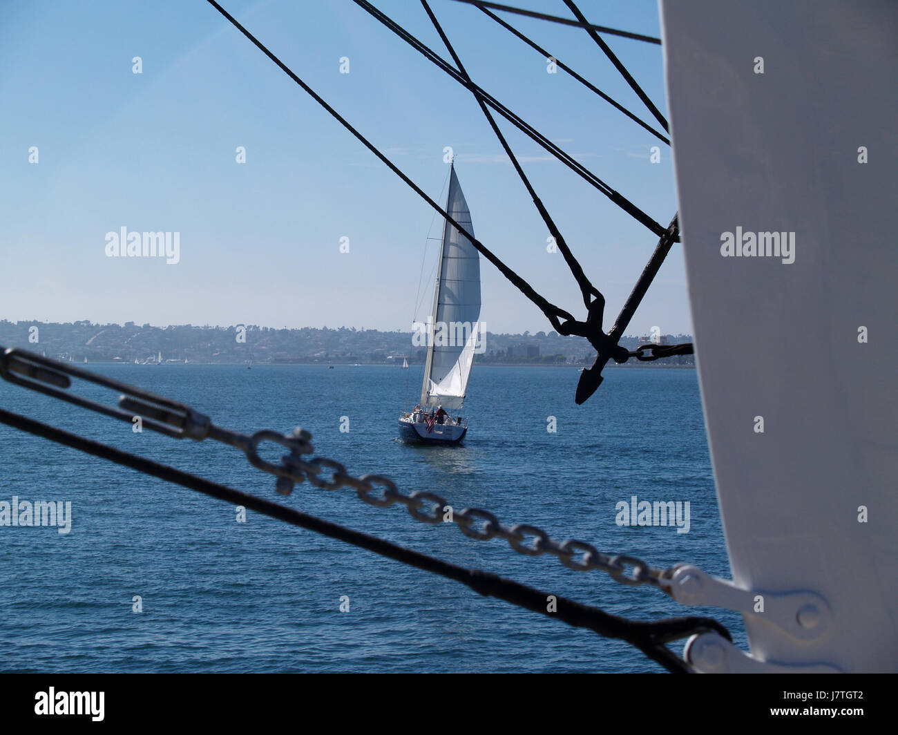 small tiny little short sailing boat sailboat nautical rigging ropes ...