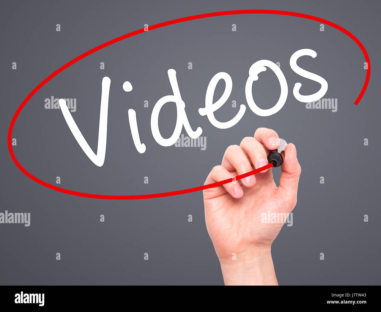 Man Hand writing Videos with black marker on visual screen. Isolated on ...