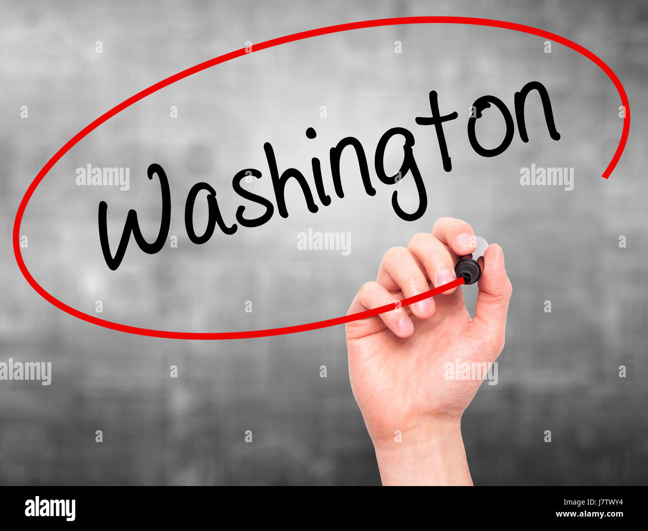Man Hand writing Washington with black marker on visual screen ...