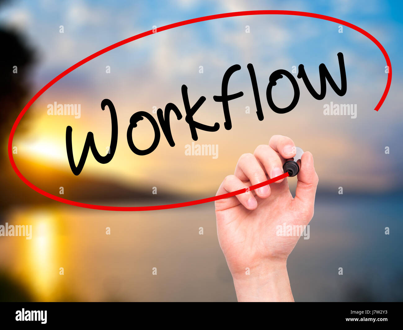 Writing Workflows Man Hand writing Workflow with black marker on visual screen. Isolated ...