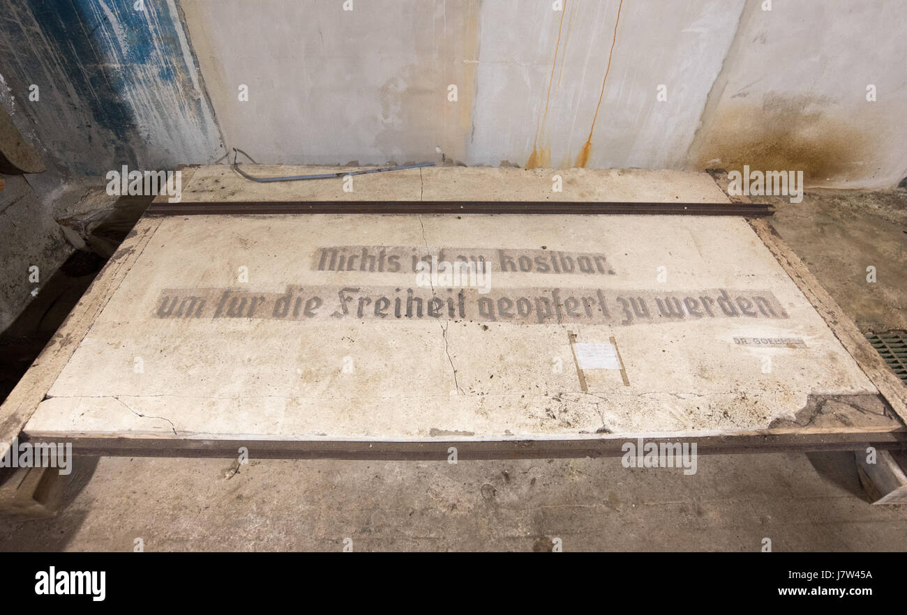 Original inscription quoting Nazi Propaganda Minister Joseph Goebbels in Nazi bunker at submarine base in Lorient, France Stock Photo