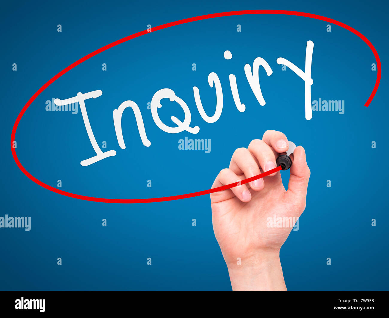 Man Hand writing Inquiry with marker on transparent wipe board ...